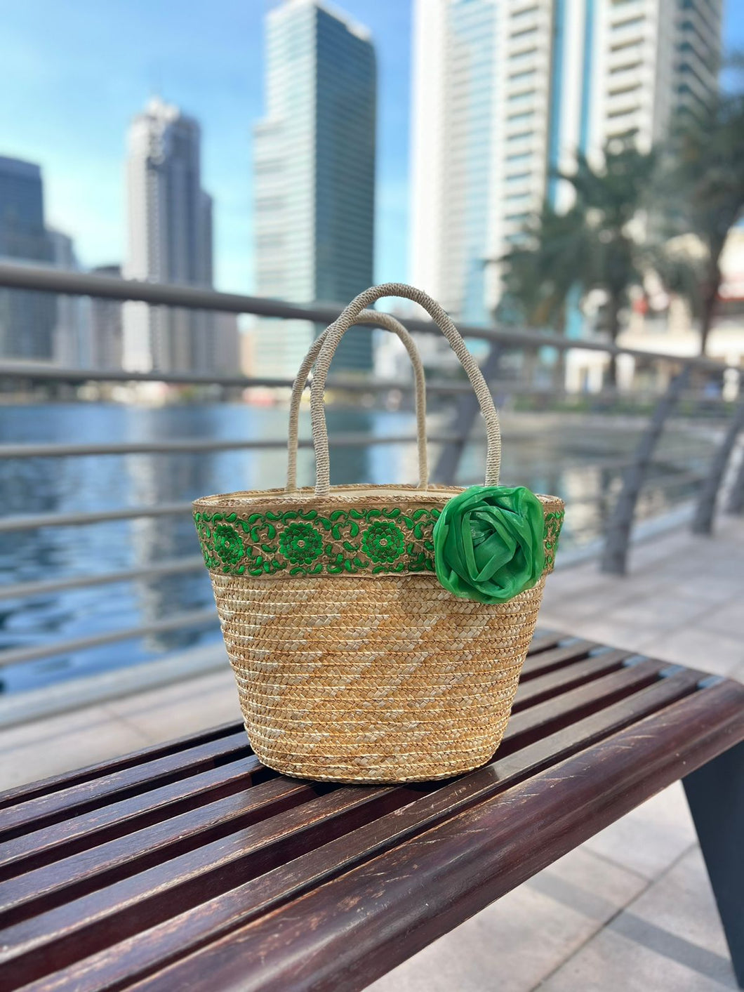 Straw basket with green flower and dantelle