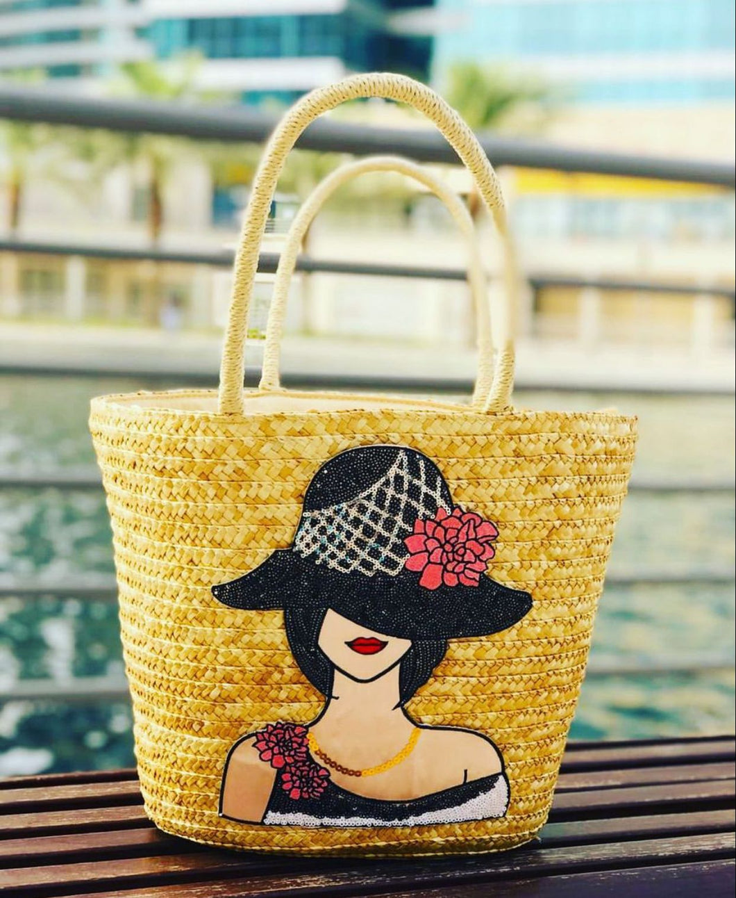 Straw basket with tropical lady
