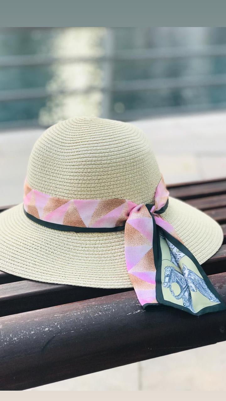 Hat with pink scarf