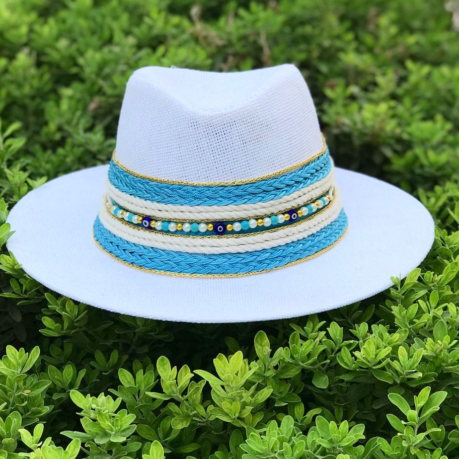 White fedora hat with light blue rope and beads