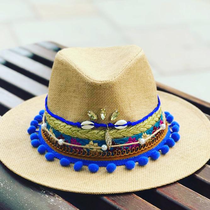 Boho hat with blue pompoms & gold details
