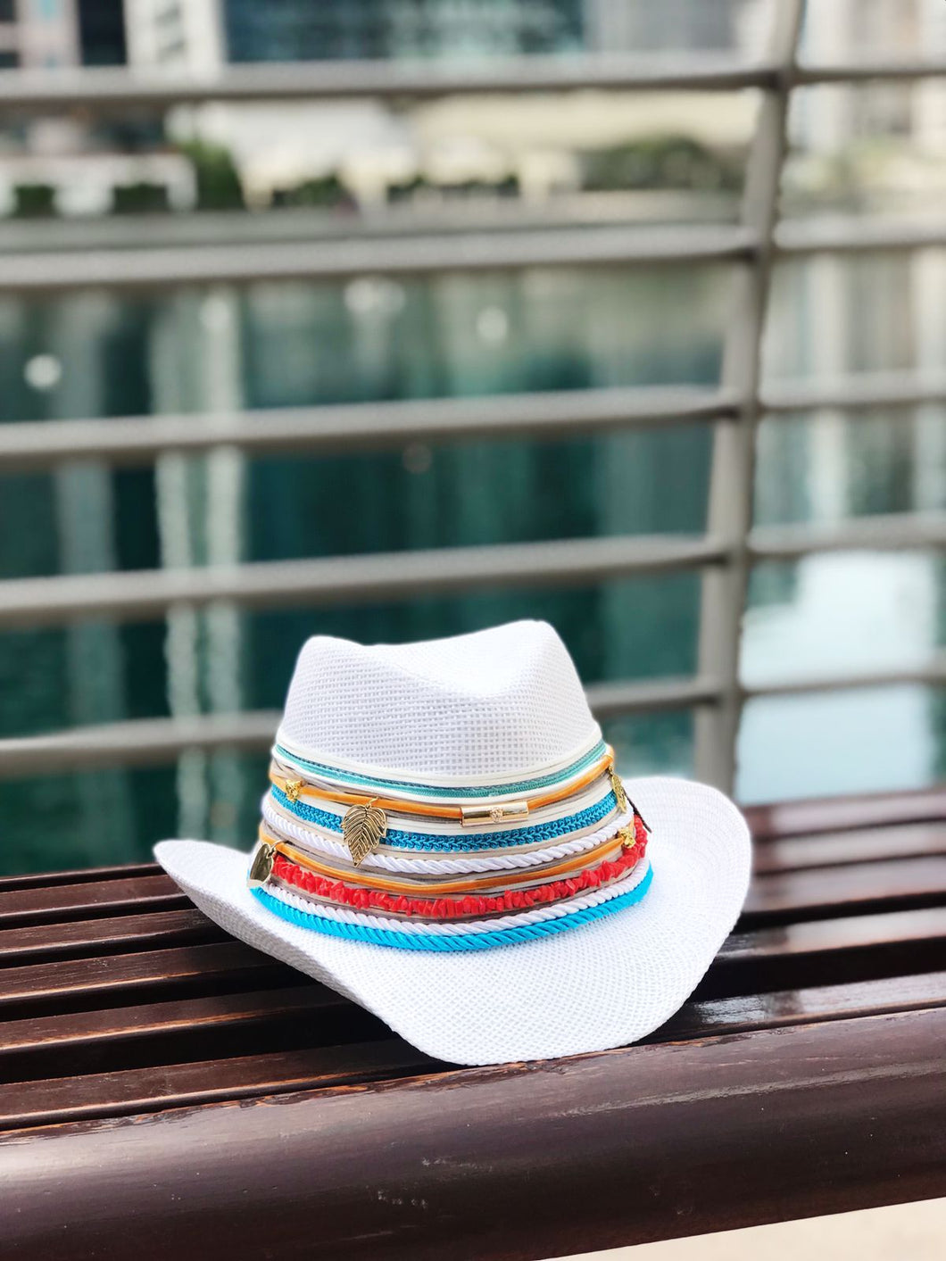 Colorful rope on white cowboy hat