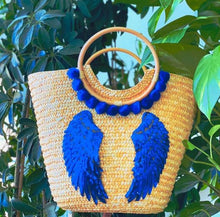Load image into Gallery viewer, Wooden basket with royal blue wings and pompoms
