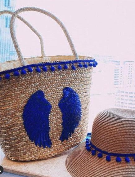 Basket with blue wings and matching hat