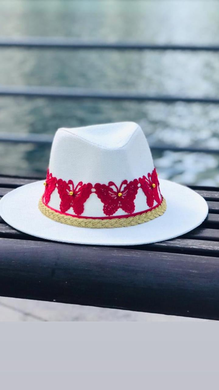White hat with butterflies in red