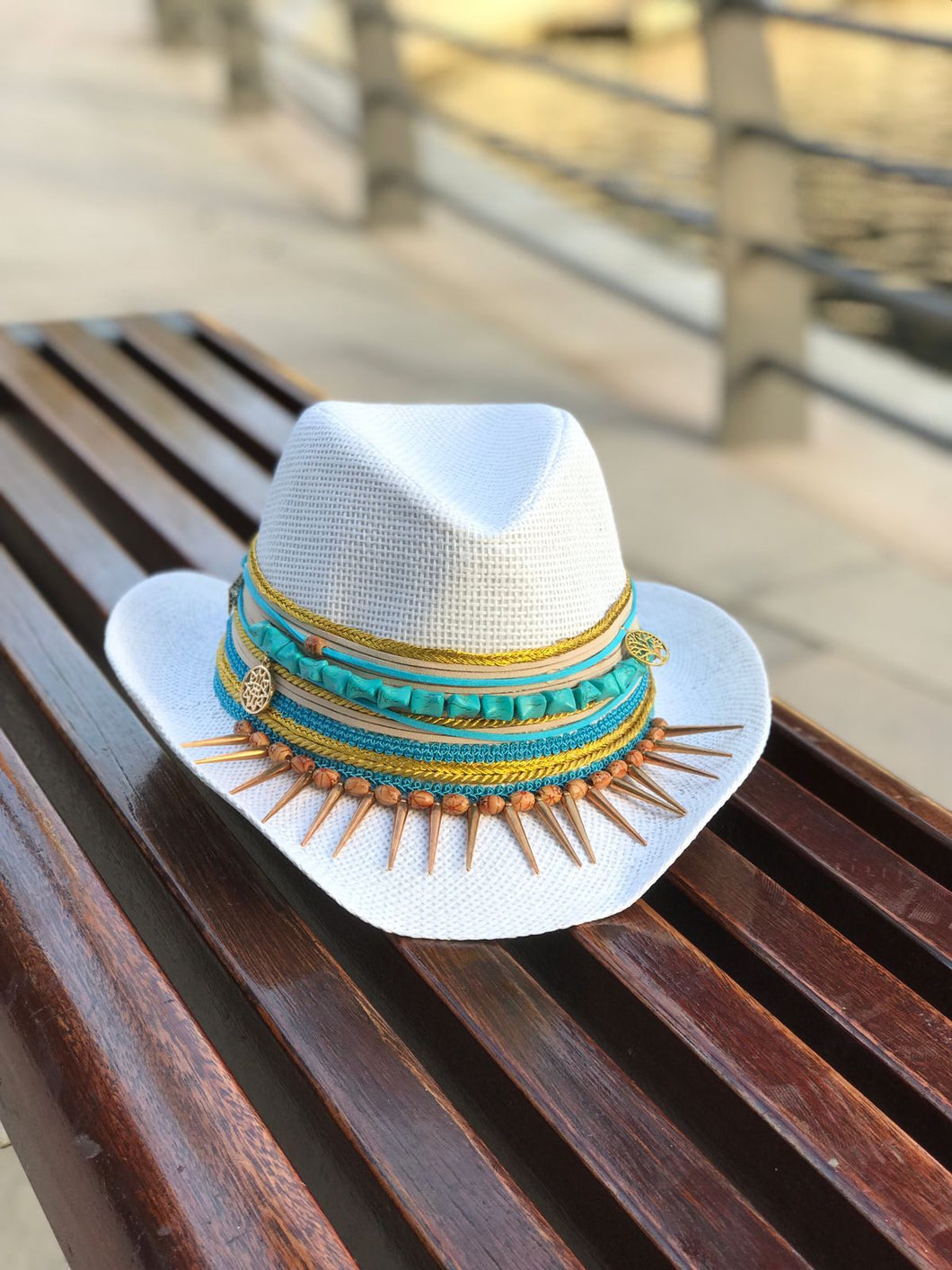 White cowboy hat with assorted beads