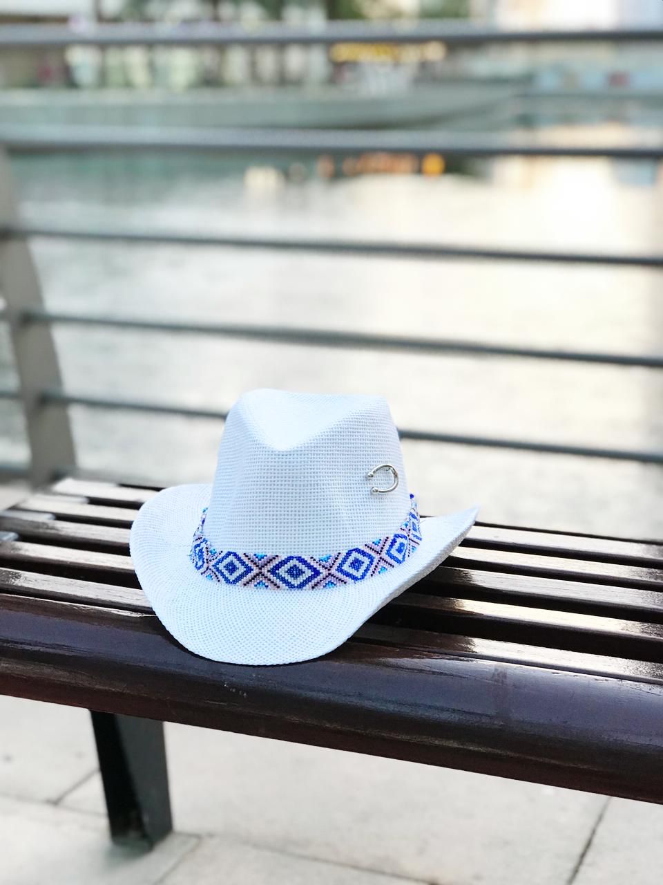 White cowboy hat with blue beads